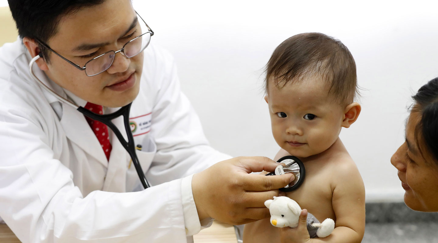 Auscultation of a child with heart disease at Tam Duc Hospital in Ho Chi Minh City, Vietnam